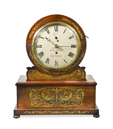 Lot 848 - A Regency rosewood drum head mantel timepiece