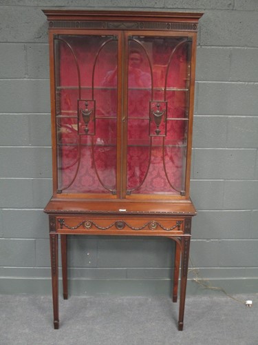 Lot 743 - A Sheraton style mahogany display cabinet on...