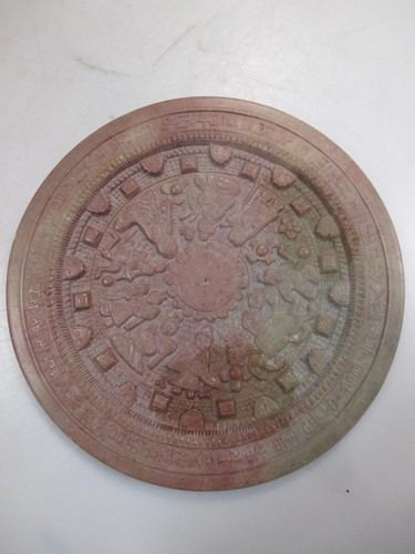 Lot 132 - A Chinese carved soapstone astrological disc,...