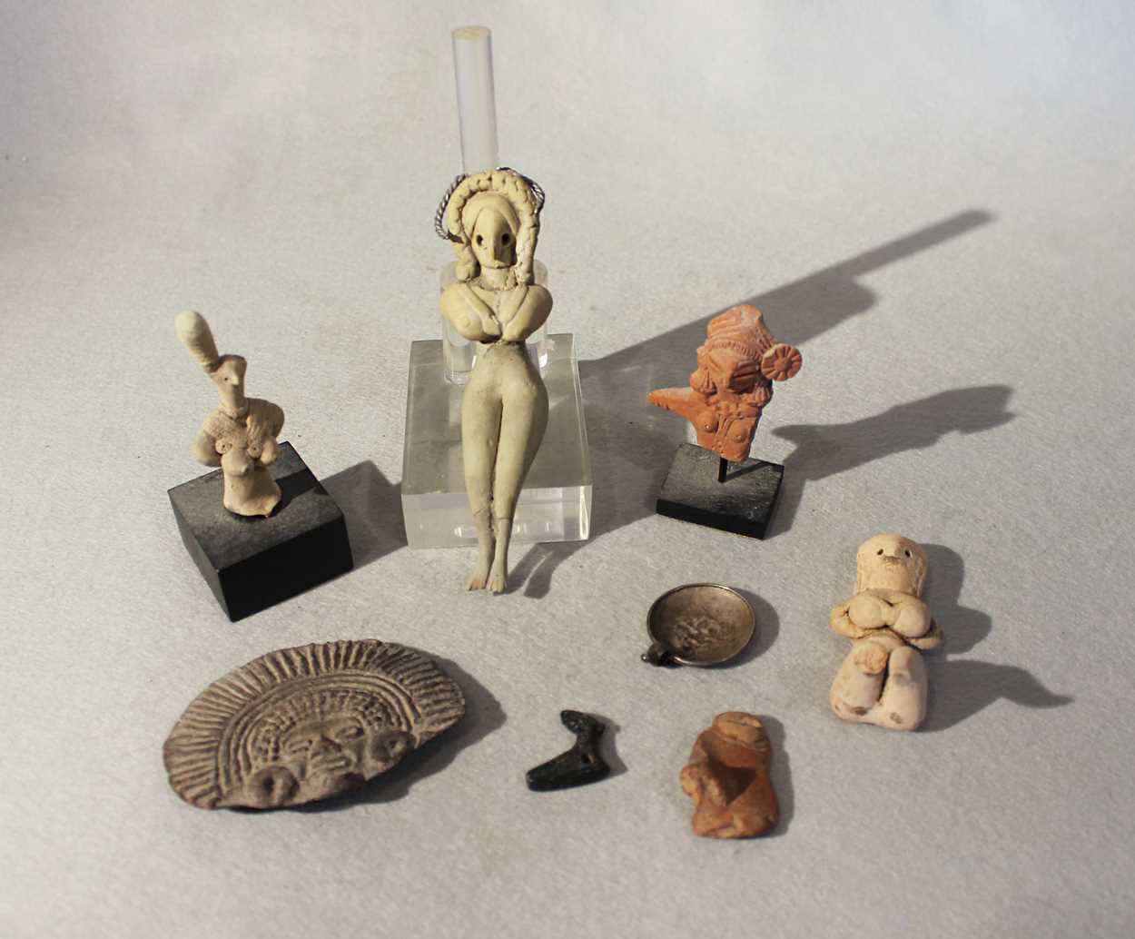 Lot 436 - A group of eight ancient Mesopotamian artefacts