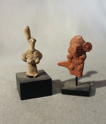 Lot 436 - A group of eight ancient Mesopotamian artefacts