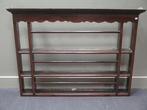 Lot 591 - A walnut drinks trolley mid 20th century: An...