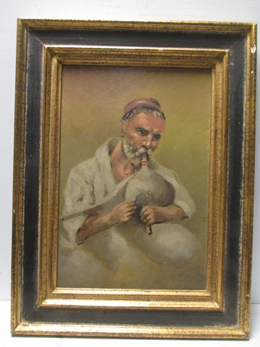 Lot 485 - An Eastern portrait of a man playing an...