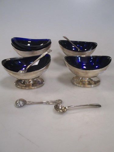 Lot 291 - A matched set of four silver salts with blue...