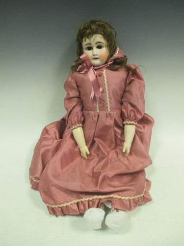 Lot 177 - A French/German bisque head doll in later...