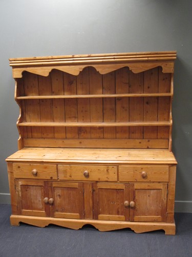 Lot 677 - A reproduction Victorian style pine dresser...