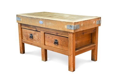 Lot 1000 - A beech butcher's block, mid 20th century