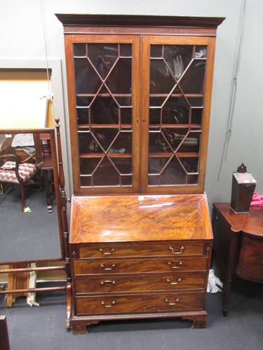 Lot 629 - A George III mahogany bureau bookcase 238 x...