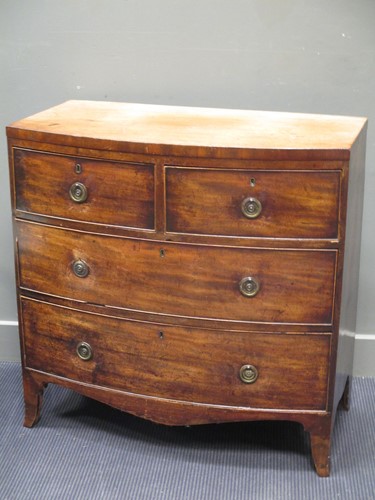 Lot 655 - A 19th century mahogany bow fronted chest of...