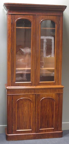 Lot 680 - A Victorian mahogany bookcase with glazed top...