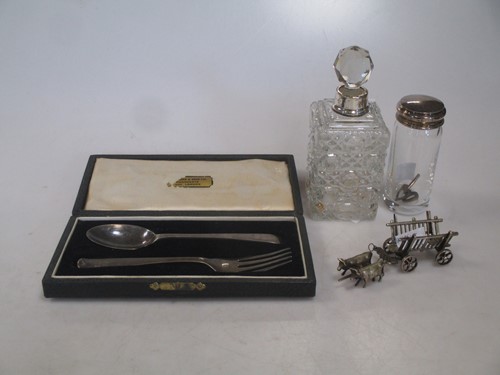 Lot 276 - A Silver christening spoon and fork, cased. A...