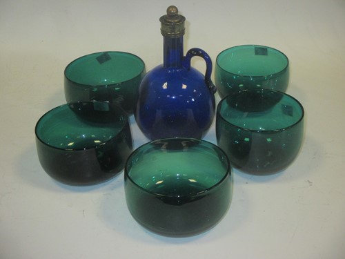 Lot 62 - A Victorian blue glass decanter. A set of five...