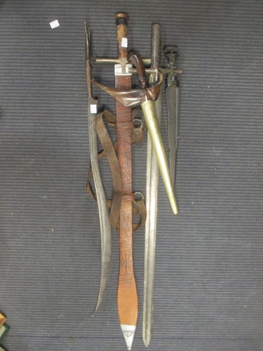 Lot 144 - A Malayan kris and 4 various edged weapons (5)
