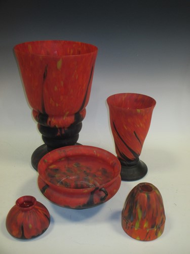 Lot 81 - A large mottled red glass vase, a similar...