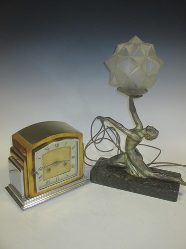 Lot 187 - An Art Deco brass and chrome mantle clock...