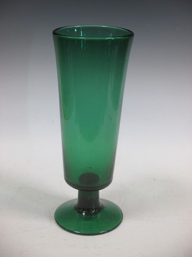 Lot 94 - A large green glass vase of flared cylindrical...