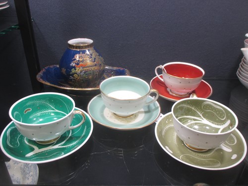 Lot 45 - Four Susie Cooper tea cups and saucers, a...