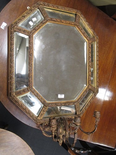 Lot 573 - An octagonal girandole with three candle branches