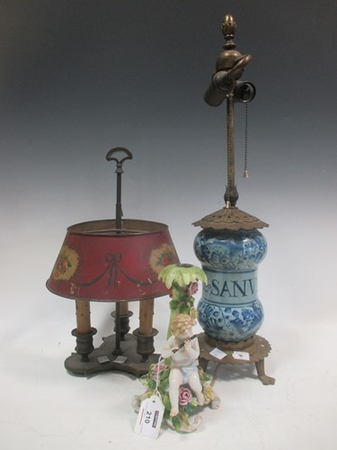 Lot 210 - A lamp en bouillotte; a blue and white jar...