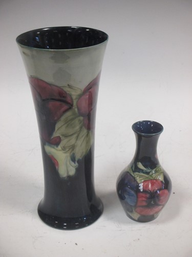 Lot 38 - A Moorcroft Pansy pattern vase and another...