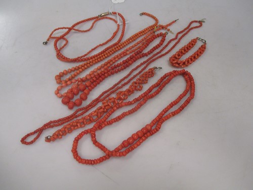 Lot 253 - A collection of coral bead necklaces etc
