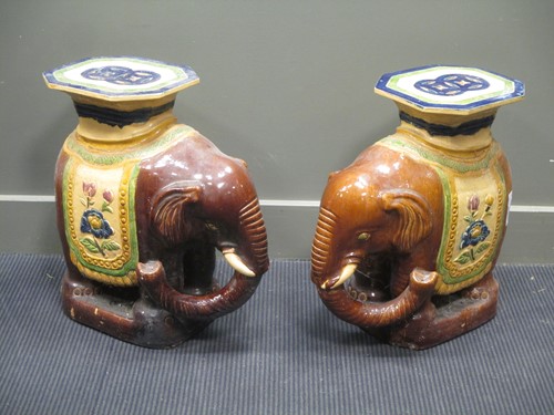 Lot 205 - A pair of Far Eastern ceramic elephant plant...