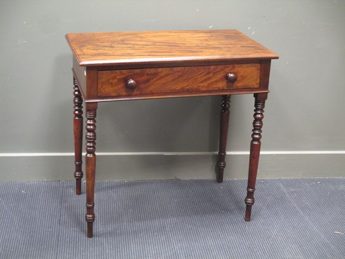 Lot 610 - A late George III flame mahogany side table,...