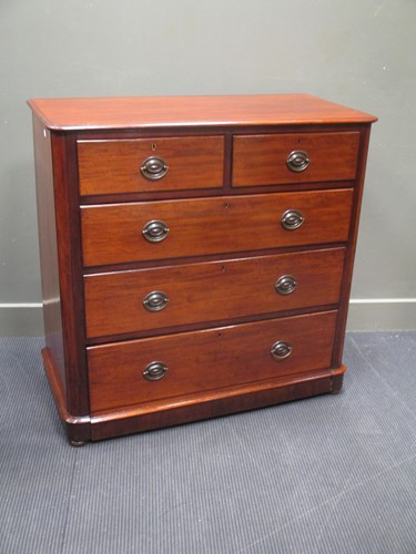 Lot 615 - A mid-Victorian mahogany round cornered chest...