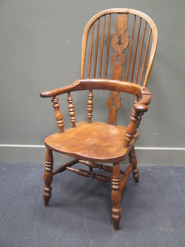 Lot 585 - Circa 1840-1880 a broad arm Windsor high back...
