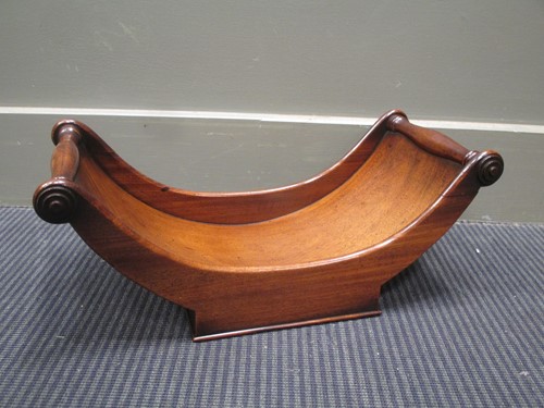 Lot 618 - A George III mahogany cheese coaster 43cm wide