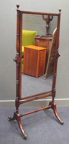 Lot 630 - A Regency mahogany cheval mirror on ornate...