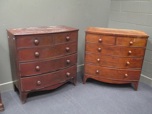 Lot 617 - A 19th century mahogany bow front chest of two...