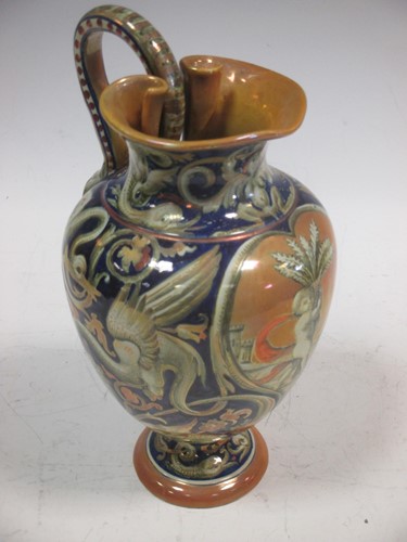 Lot 83 - A Cantagalli ewer, decorated with a cherub in...