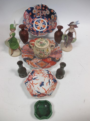 Lot 86 - A Japanese imari bowl with a lobed rim, an...