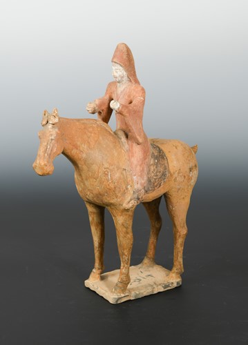 Lot 80 - A Chinese polychrome painted pottery horse with Middle Eastern rider