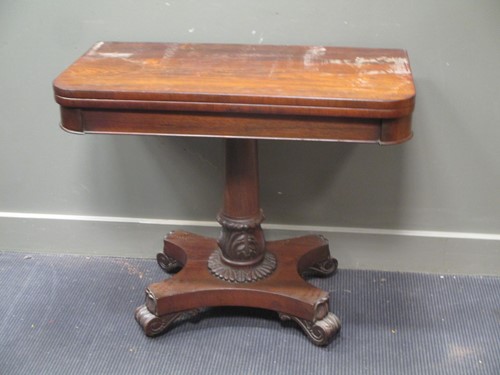 Lot 592 - A George IV mahogany card table, the rounded...