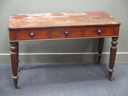 Lot 607 - A 19th century mahogany side table, fitted...