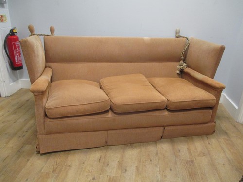 Lot 499 - A yellow/buff upholstered Knowle sofa, 190cm wide