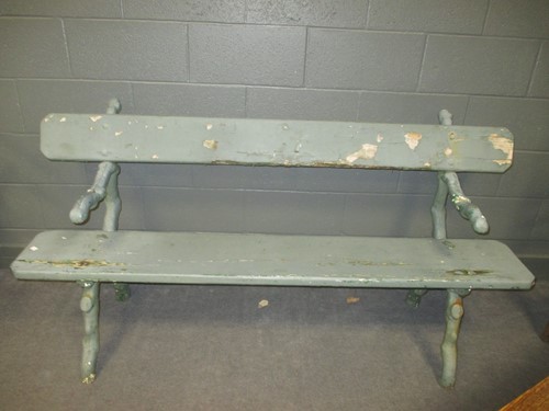 Lot 650 - A Victorian cast iron garden bench with timber...