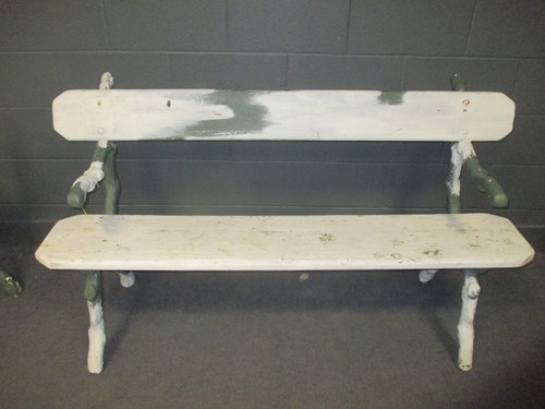 Lot 533 - A Victorian cast iron garden bench with timber...
