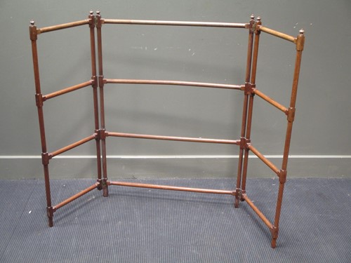 Lot 518 - A 19th century mahogany towel rail 104cm high