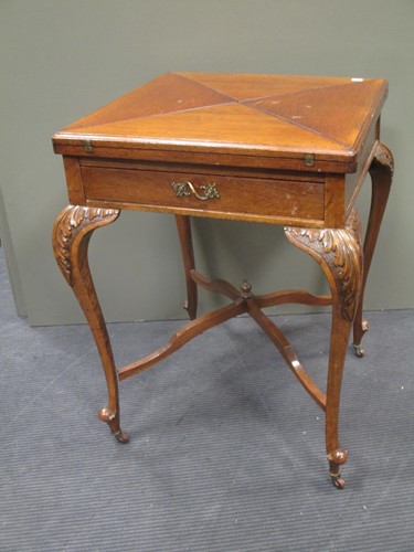 Lot 578 - An Edwardian mahogany envelope card table 73 x...