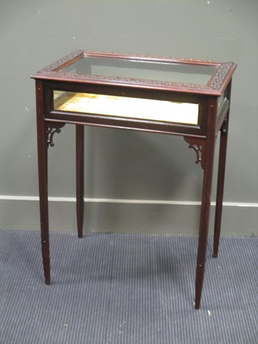Lot 697 - A mahogany glazed top display table with...