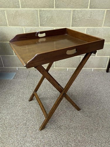 Lot 526 - A mahogany butler's tray and folding stand