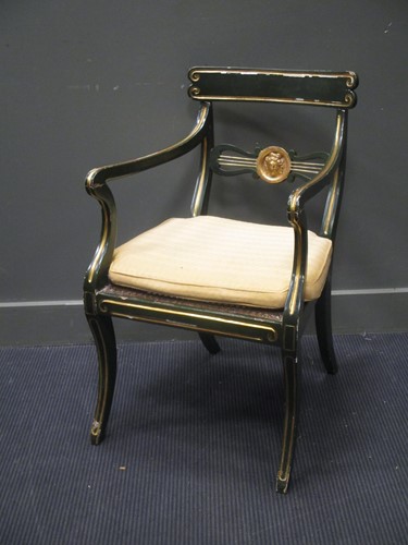 Lot 466 - A Regency painted and gilt decorated elbow...