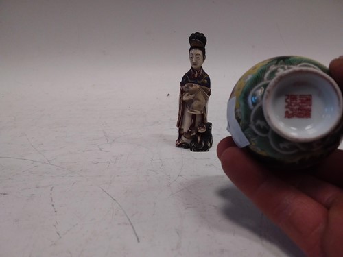 Lot 307 - A Chinese carved and painted ivory snuff...