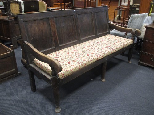 Lot 594 - An 18th/ 19th century oak tavern settle on...