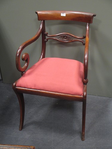 Lot 649 - A Regency mahogany arm chair on sabre legs