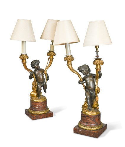 Lot 821 - A pair of French late 19th century bronze and gilt-bronze two-branch candelabra