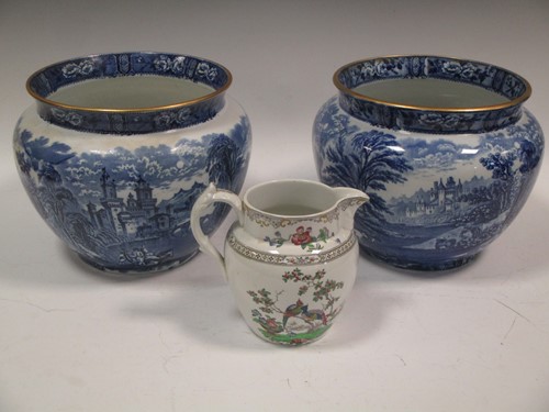 Lot 117 - A pair of blue and white jardinières with...
